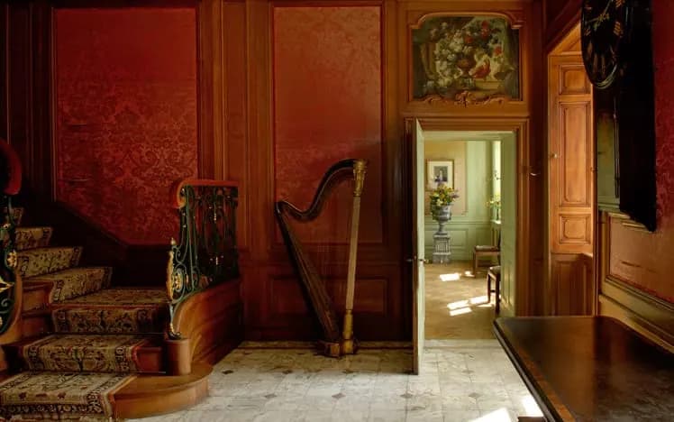 Staircase hall with harp