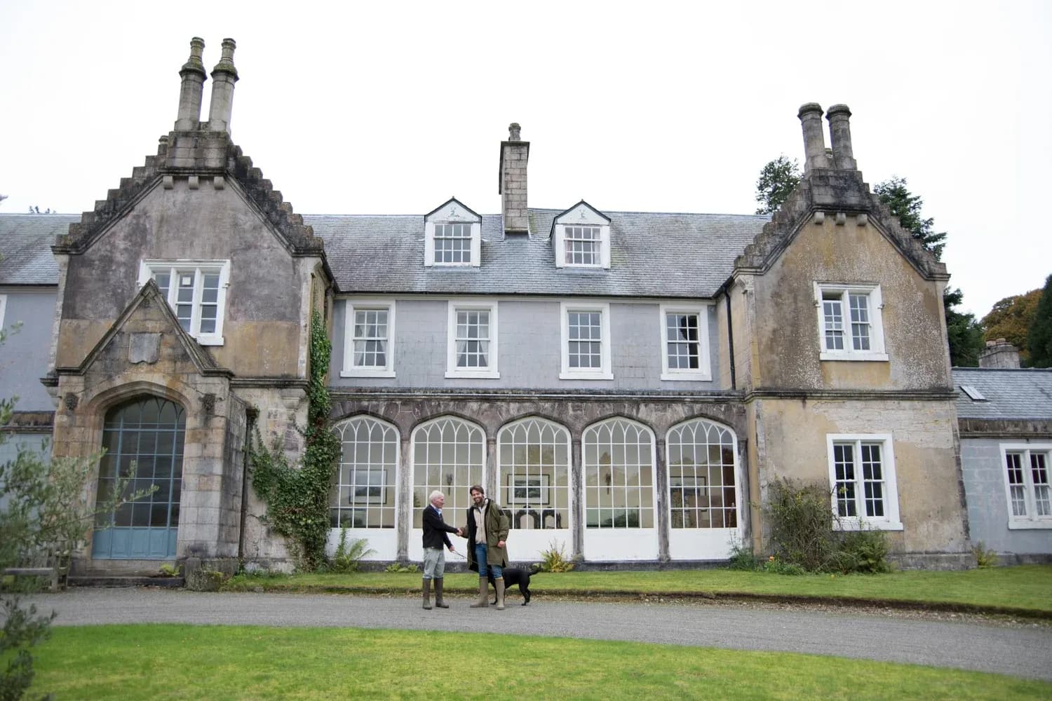 The house front, with its long conservatory windows