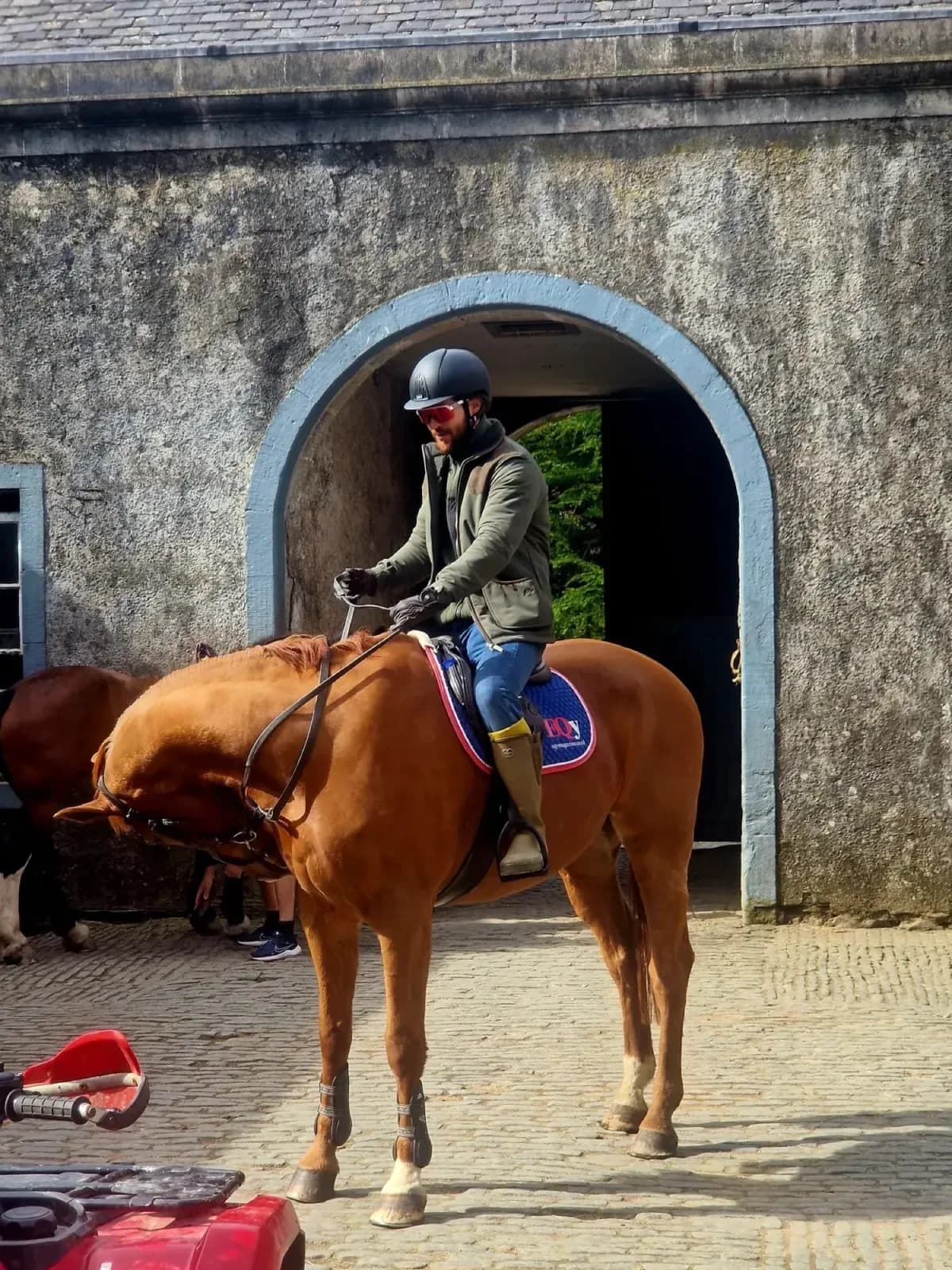 Rider under the stableyard arch