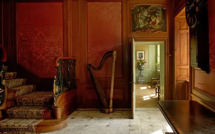 Staircase hall with harp