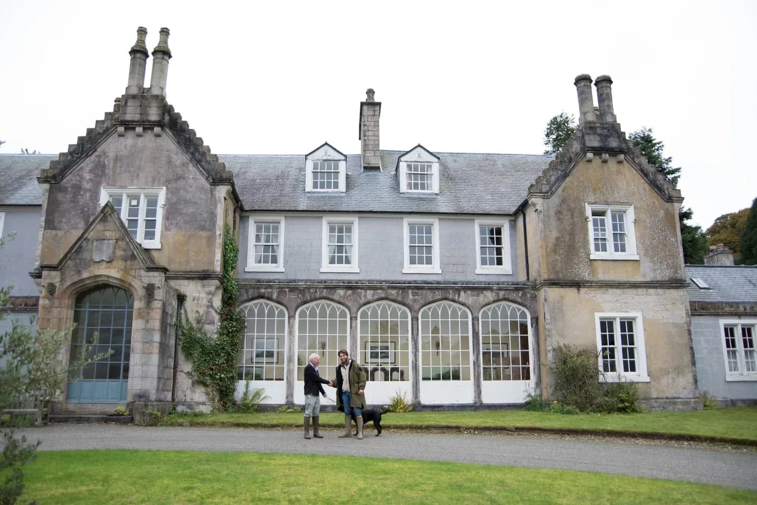 The house front, with its long conservatory windows