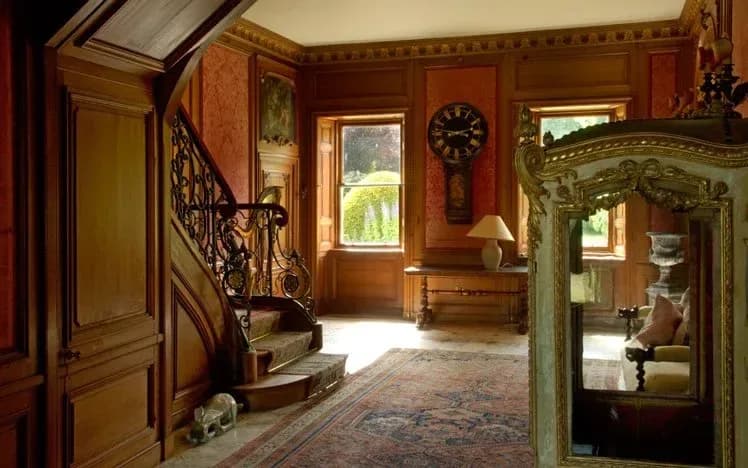 The panelled staircase hall