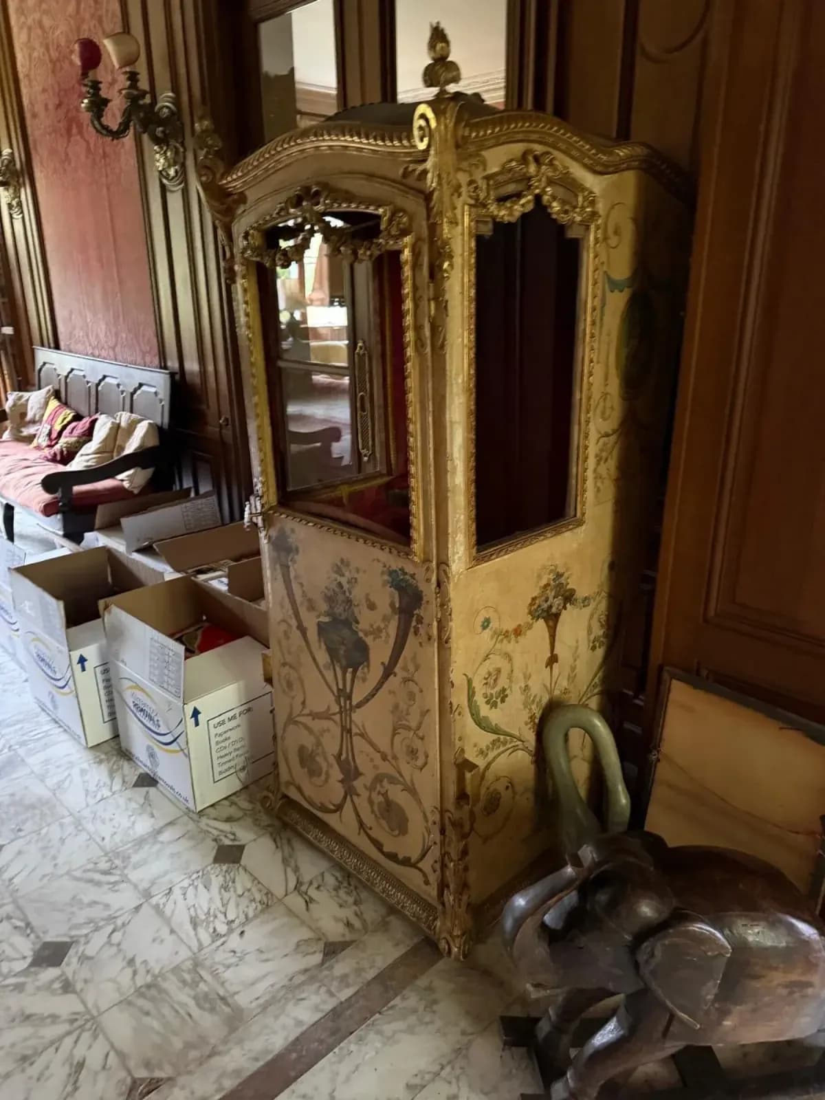 Historic sedan chair in the hall