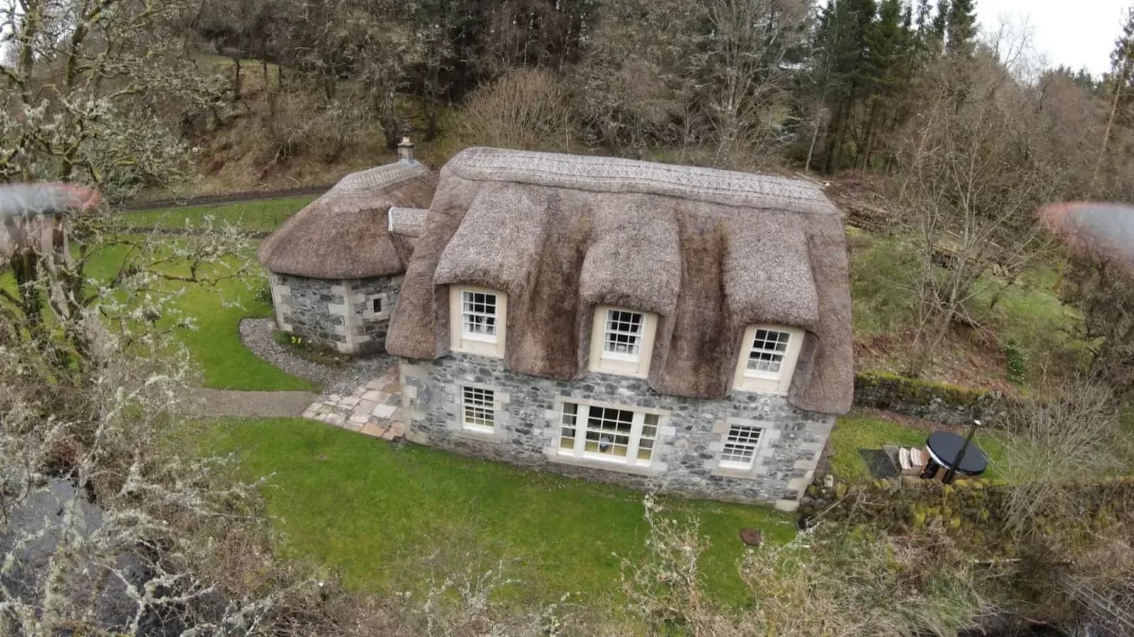 Thatched cottage in the woods